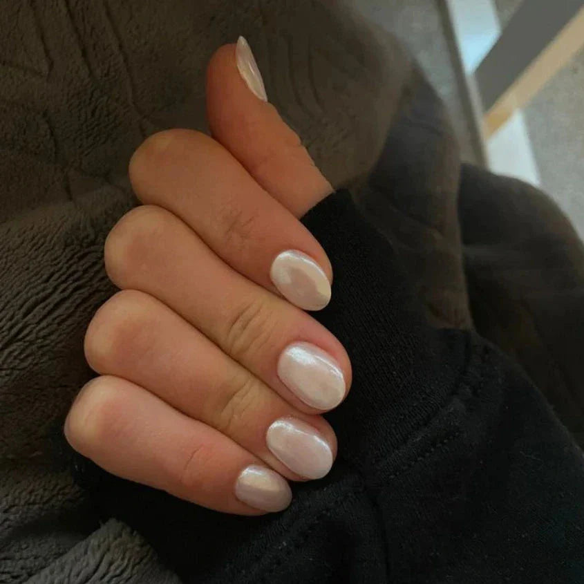 Pearl white gel nail strips closeup