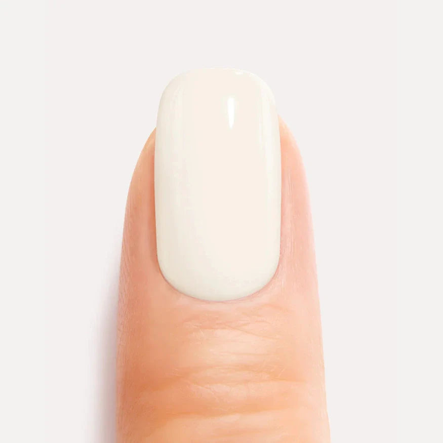 Cream white gel nail close up
